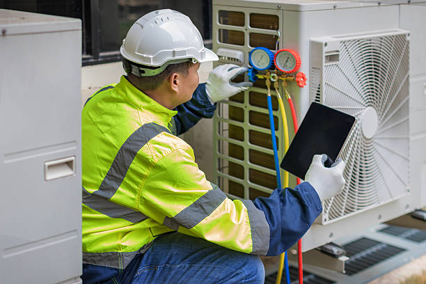 Professional Hvac technician working in Highland, MD
